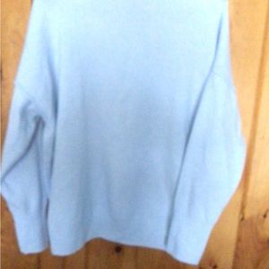 Light blue sweater medium very loose lots of room very soft smoke free home